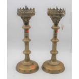 A pair of modern brass ecclesiastical style pricket candle sticks, height 49cm