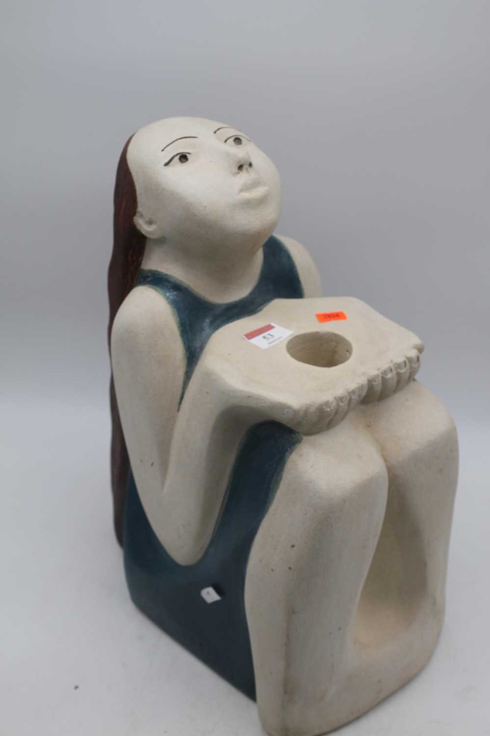 A 20th century Ken Patecky hollow moulded pottery model of a girl in seated pose, height 41cm