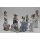 A collection of eight various Nao Spanish porcelain figures, height of largest 25cm