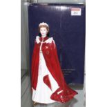 A Royal Worcester figure in celebration of The Queen's 80th birthday, dressed in the robes of the