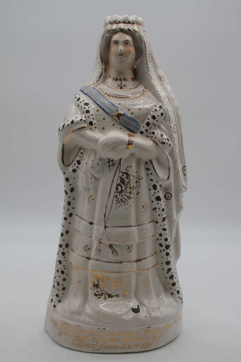 A large Edwardian Staffordshire figure of Queen Victoria, height 41cm