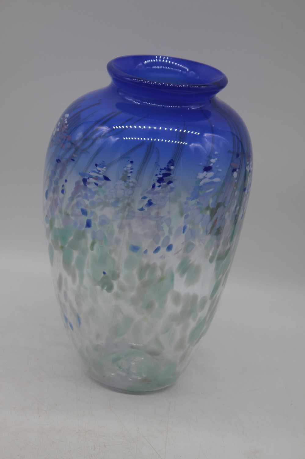 A large vintage studio glass blue tinted art glass vase by signed William Walker of baluster form,
