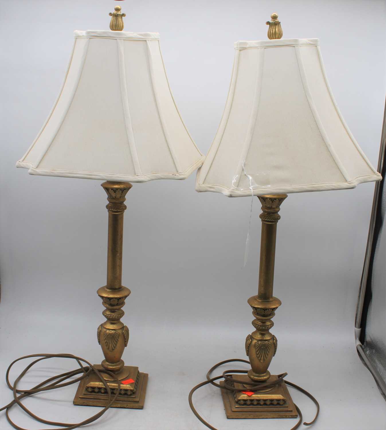 A pair of French style gilt table lamps with silk shades, height 23cm