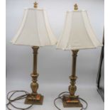 A pair of French style gilt table lamps with silk shades, height 23cm