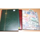 Ephemera to include modern issue bank notes from around the world, two stamp albums, one folder of