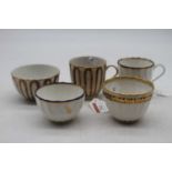 Early 19th century Derby porcelain wares, comprising two coffee cans and three tea bowls, each being