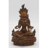 A reproduction jewelled bronzed metal deity figure, h.22cm