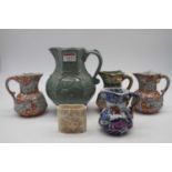 A collection of Masons Ironstone wares, being octagonal jugs and one spill-holder, the largest jug