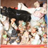 A collection of assorted figures to include Hummel etc