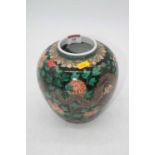 A reproduction Chinese famille noir vase of squat baluster form