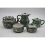 A Chinese soft paste porcelain and metal mounted five-piece tea set