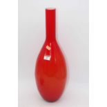 A large orange tinted art glass bottle vase, height 51cm