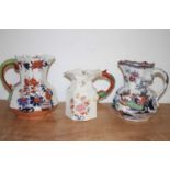 A large Masons ironstone jug together with one other smaller example and an unmarked example,