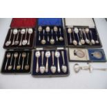 A collection of miscellaneous items, to include silver flatware and medallions including The Essex