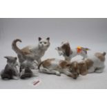 A collection of six various Lladro figures of animals to include puppy, kittens, cat, etc