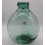 A green tinted glass carboy height 39cm