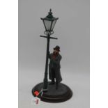 A modern Fairweather Collection resin figure of a man and gas light, height 33cm