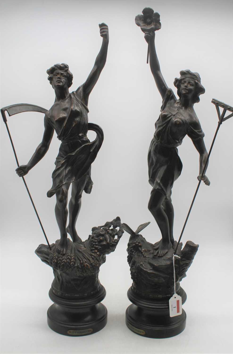 A pair of early 20th century spelter figures, each on wooden socle base entitled Le Faucheur and