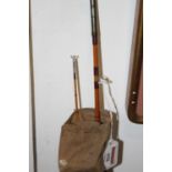 A split cane two-piece fly fishing rod in canvas bag