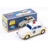 HC Toys Hong Kong plastic battery-operated Volkswagen Beetle Police Car comprising of a white body