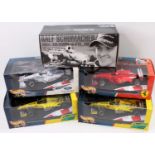 A Hot Wheels 1/18 scale boxed Formula One Race Car group to include a Ralf Schumacher Imola/San