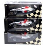 A Minichamps BAR Honda 1/18 scale boxed Jenson Button diecast group to include BAR Honda limited