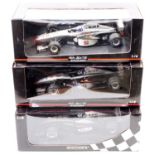 A Minichamps 1/18 scale Maclaren Collection diecast group, to include a David Coulthard Maclaren