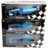 A Minichamps 1/18 scale boxed Formula One Racing diecast gro9up to include a limited edition 1 of