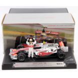 A Hot Wheels Racing 1/18 scale model of a Vodafone Maclaren Mercedes No. M8742 F1 race car housed in