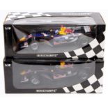 A Minichamps Red Bull Racing David Coulthard related 1/18 scale F1 race car group, to include a