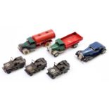 A collection of six various Triang Minic tinplate and clockwork vehicles to include a BP Fuel