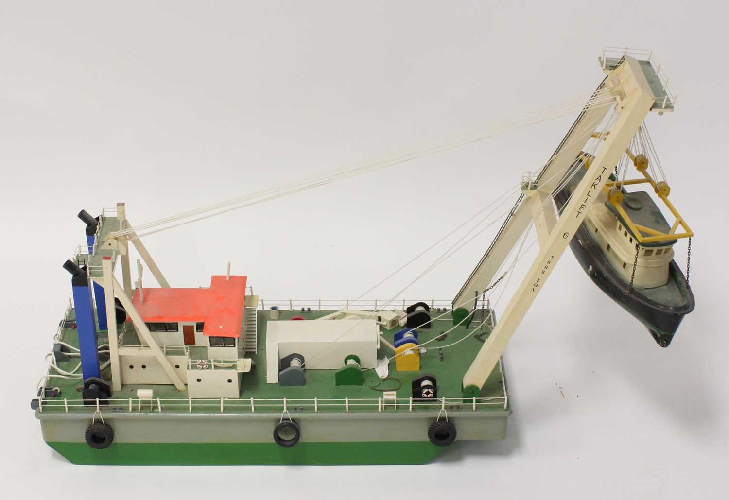 A wooden scratch built model of a Taklift 6 2000 ton floating Sheerleg, constructed to a good