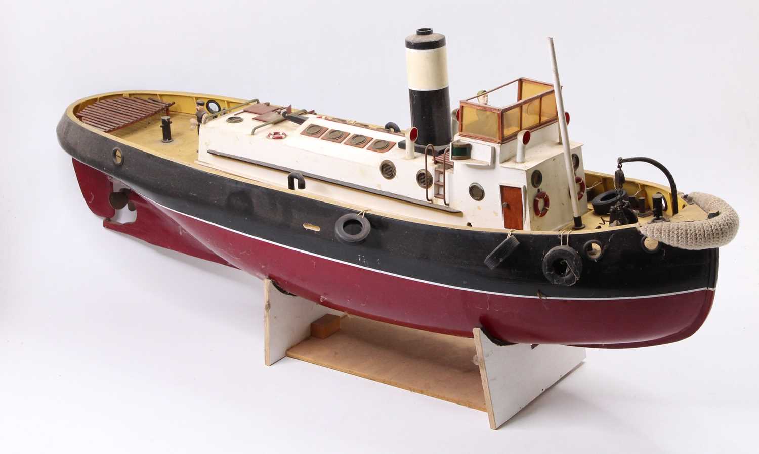 A wooden kit built model of a radio controlled tug boat, hand painted in maroon and black with - Image 3 of 6