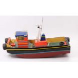 A wooden scratch built model of a radio controlled pusher tug, hand painted example with removable