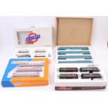 A collection of Liliput, Roco and H0 scale boxed coach packs and train sets to include a Roco No.