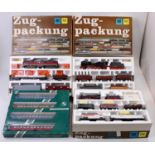 A collection of Sachsen Models and Piko boxed train sets and coach packs to include a Piko H0