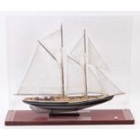 A static display model of a Bluenose Schooner finished in black & white with full rigging and