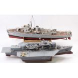 Two plastic kit built and scratch built naval interest radio controlled boats, both models require