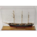 A very well made wooden and plastic kit built model of Victoria 3 mast sailing boat housed in a