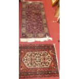 A small Persian woollen hall rug, 83 x 64cm; together with a machine woven Persian style hall rug