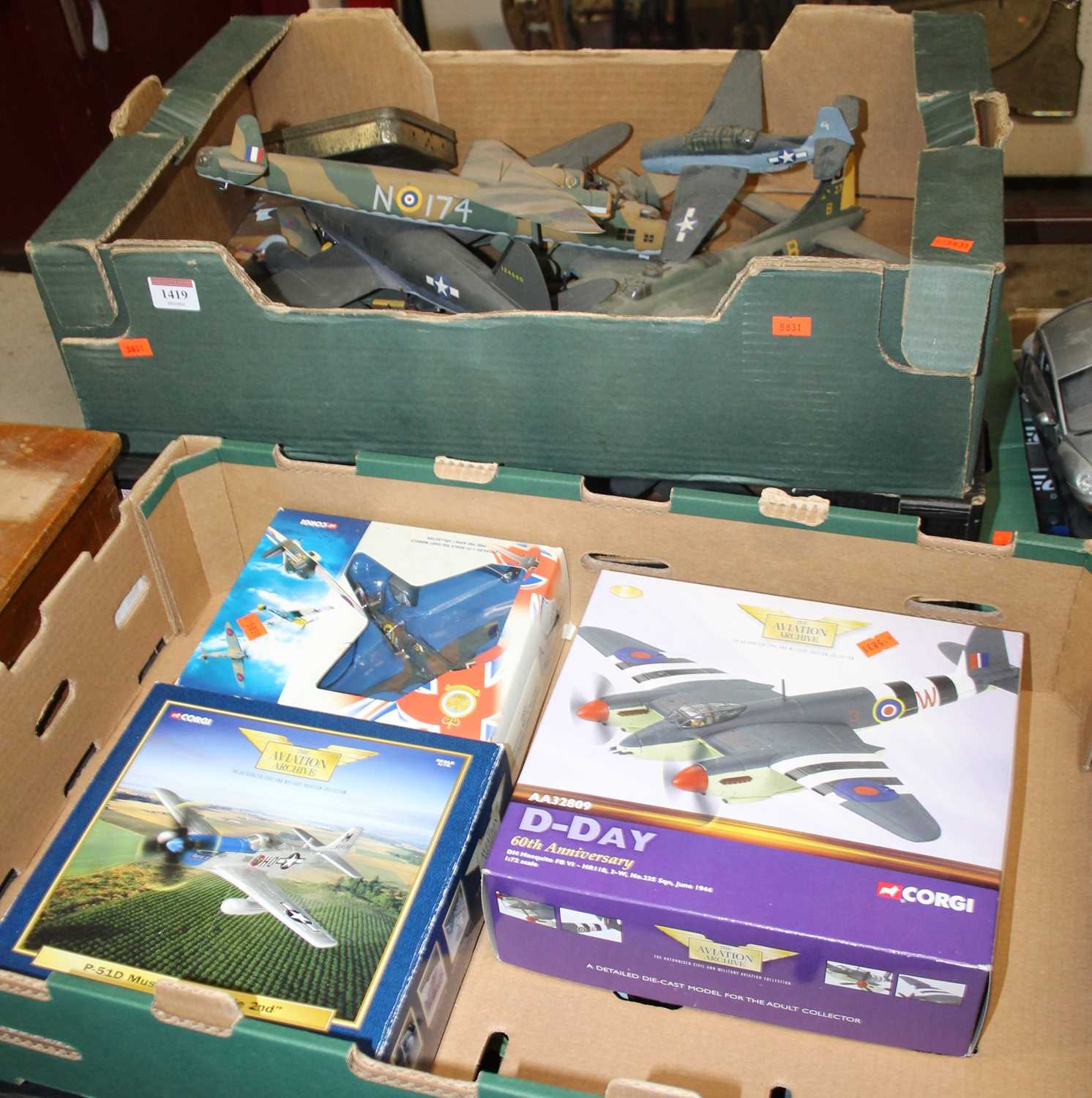 Four trays of mixed diecast, wooden and resin kit built and manufactured aircraft to include an