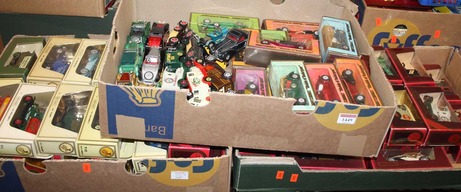 Three trays containing a collection of mixed boxed and loose Matchbox Models of Yesteryear to