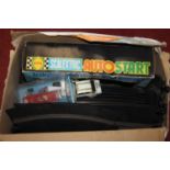 A quantity of mixed Scalextric to include the Auto start gift set