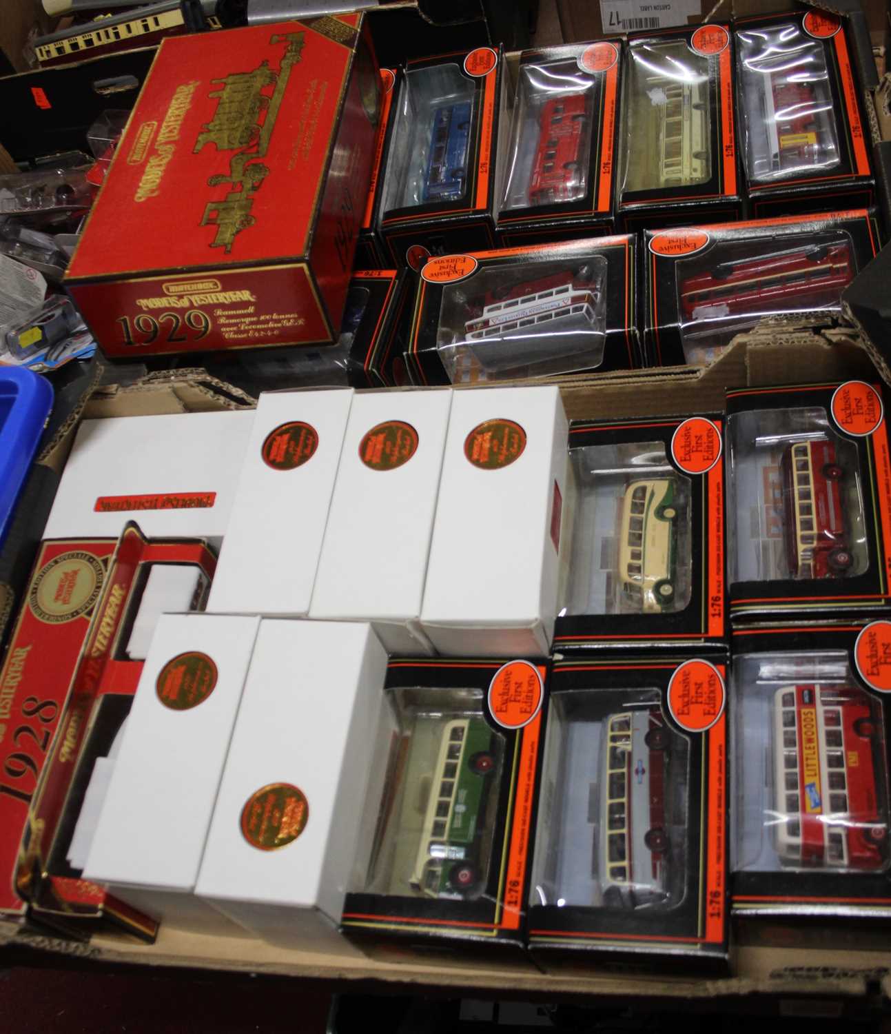 Two trays containing a collection of mixed public transport and commercial vehicle interest