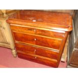 A 19th century German flame mahogany round corner chest of four long drawers (lacking supports), w.