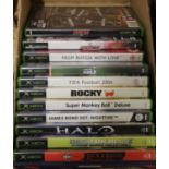 A collection of original Xbox computer games to include Super Monkey Ball Deluxe, James Bond 007,