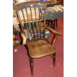 A circa 1900 elm and beech stickback farmhouse open armchair