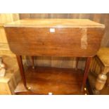 An early 19th century mahogany Pembroke table, having single end drawer