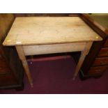 A rustic pine kitchen side table, raised on turned supports, w.79cm