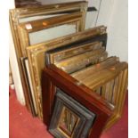 Assorted picture frames largely being circa 1900 gilt composition examples, various sizes